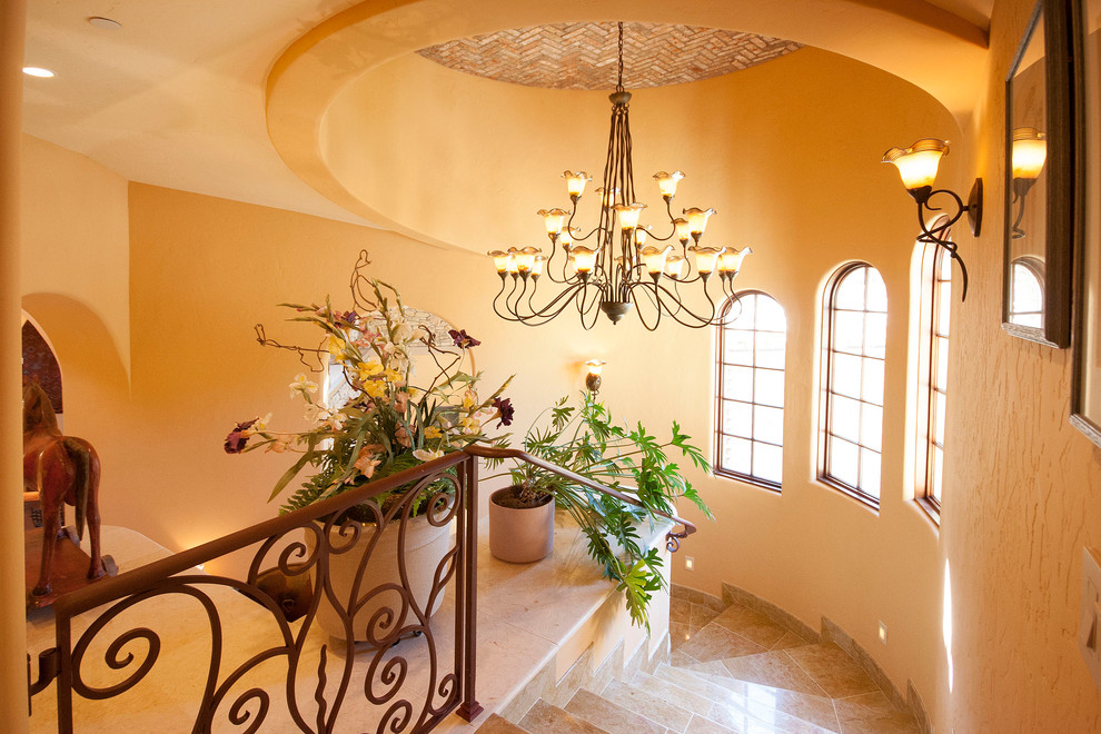 This is an example of a mediterranean tile curved staircase in Los Angeles.