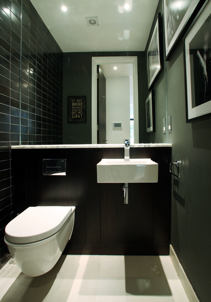 This is an example of a contemporary powder room in London.
