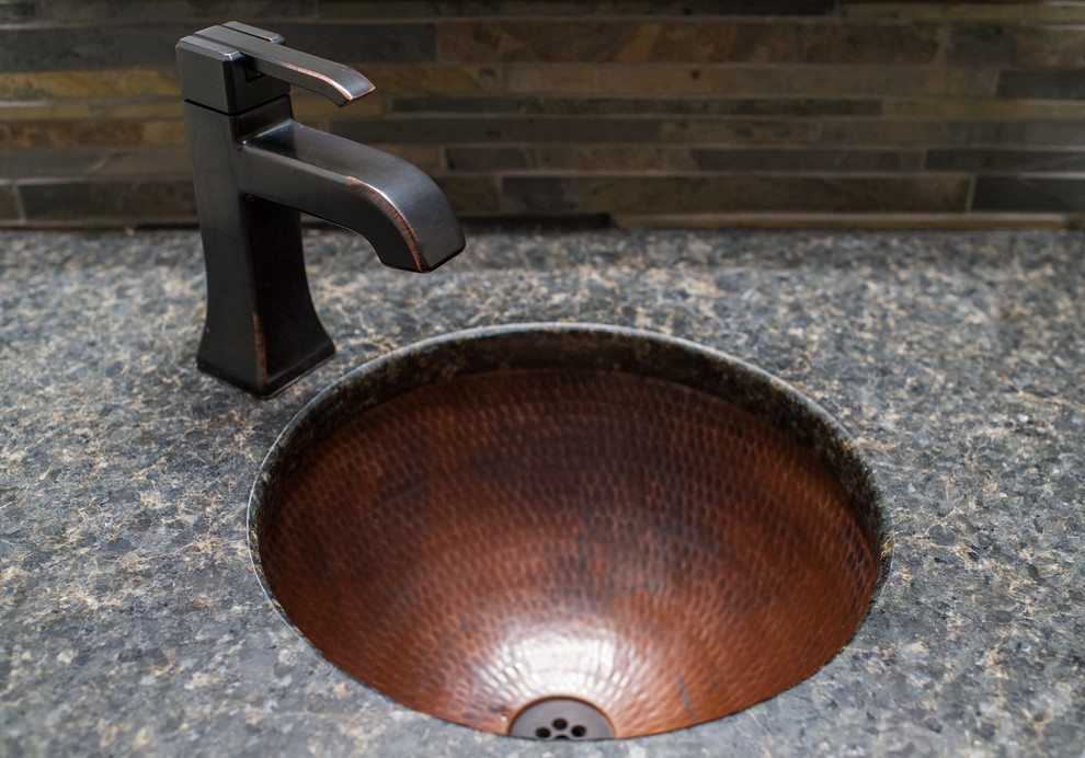 Inspiration for a small rustic multicolored tile medium tone wood floor bathroom remodel in Chicago with an undermount sink, furniture-like cabinets, medium tone wood cabinets, granite countertops, a two-piece toilet and green walls