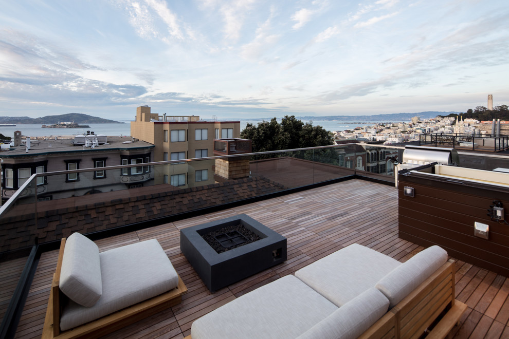 Inspiration for a mid-sized arts and crafts rooftop deck in San Francisco with a fire feature and no cover.
