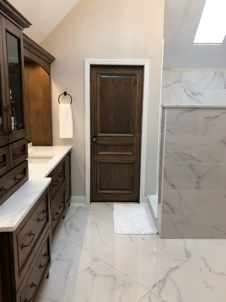 Large traditional master bathroom in Other with flat-panel cabinets, a freestanding tub, an open shower, a one-piece toilet, white tile, porcelain tile, white walls, porcelain floors, an undermount sink, engineered quartz benchtops, white floor, an open shower, white benchtops, an enclosed toilet, a double vanity, a built-in vanity and vaulted.