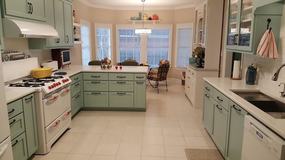 Design ideas for a mid-sized midcentury eat-in kitchen in Miami with an undermount sink, shaker cabinets, blue cabinets, quartzite benchtops, white splashback, subway tile splashback, white appliances, ceramic floors, a peninsula and beige floor.
