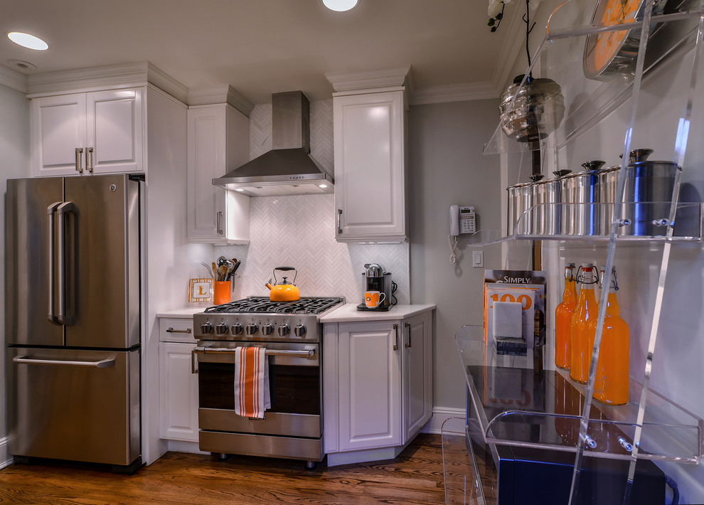 Example of a transitional kitchen design in New York