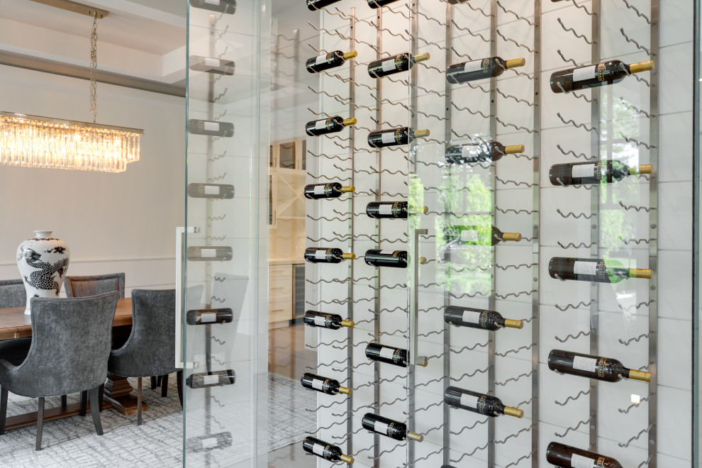 This is an example of a beach style wine cellar in New York.