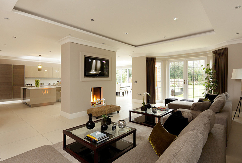 Photo of a large modern living room in London with porcelain floors.