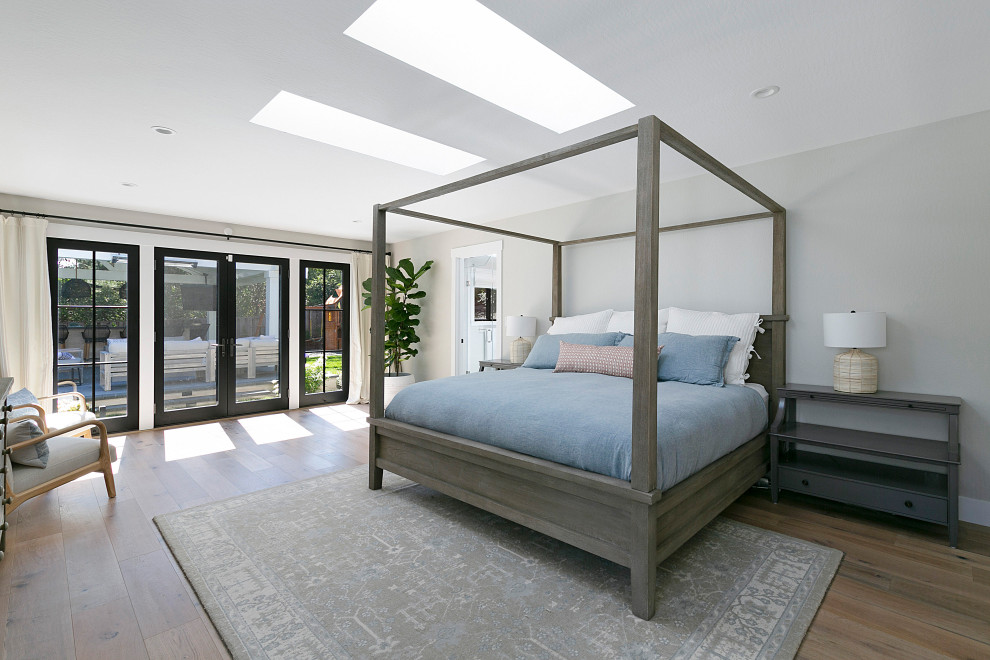 Design ideas for a large transitional master bedroom in San Francisco with grey walls, light hardwood floors and beige floor.