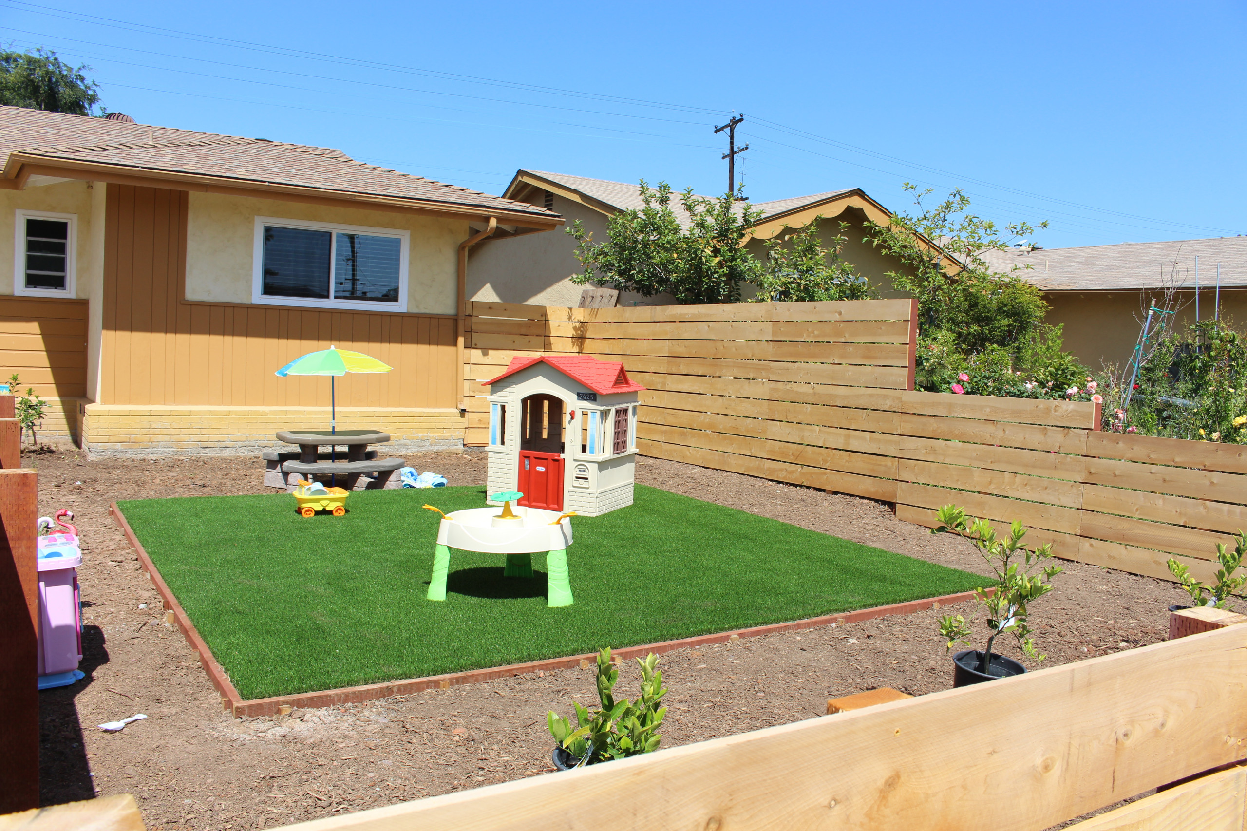 Artificial Lawn Install with Drought tolerant landscape