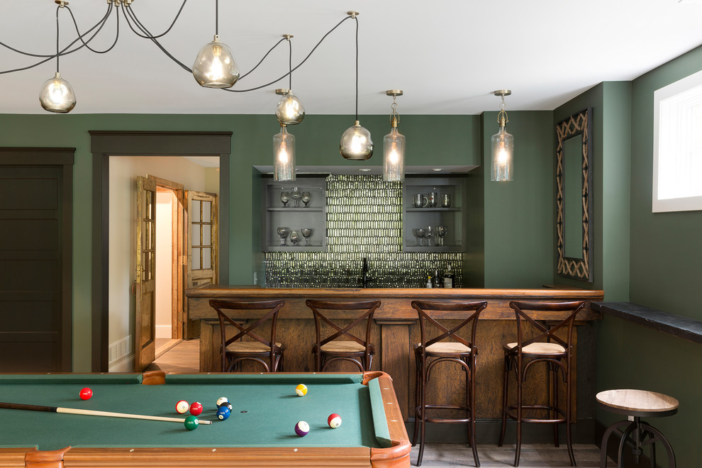 Large transitional single-wall seated home bar in Minneapolis with an undermount sink, open cabinets, quartz benchtops, green splashback, glass tile splashback, dark hardwood floors and brown floor.
