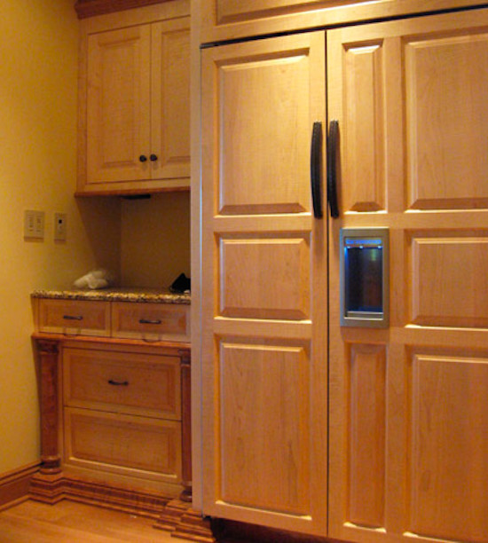 Design ideas for a traditional kitchen in Other with light wood cabinets.