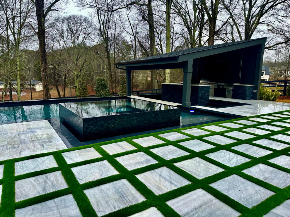 Inspiration pour une piscine minimaliste de taille moyenne et rectangle.