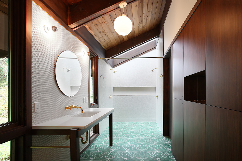 Midcentury 3/4 bathroom in Seattle with an undermount sink, flat-panel cabinets, dark wood cabinets, a double shower, white tile and turquoise floor.