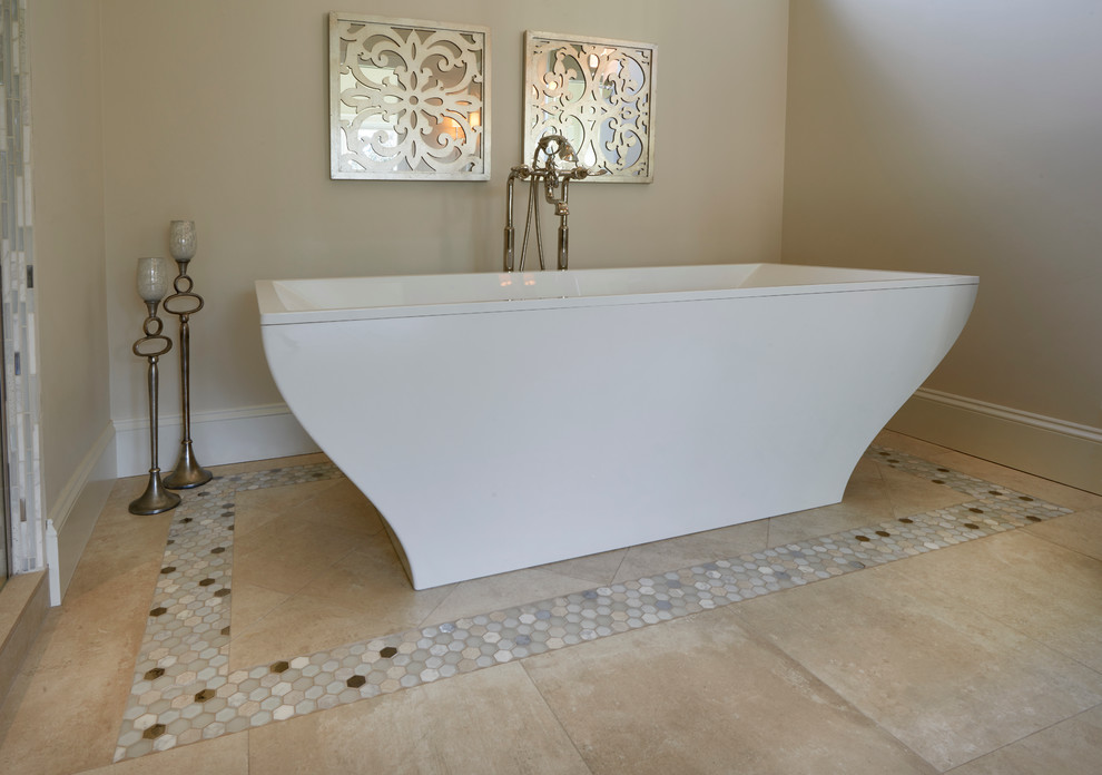 Mid-sized transitional master bathroom in Phoenix with beaded inset cabinets, beige cabinets, a freestanding tub, a corner shower, travertine, beige walls, travertine floors, an undermount sink and marble benchtops.