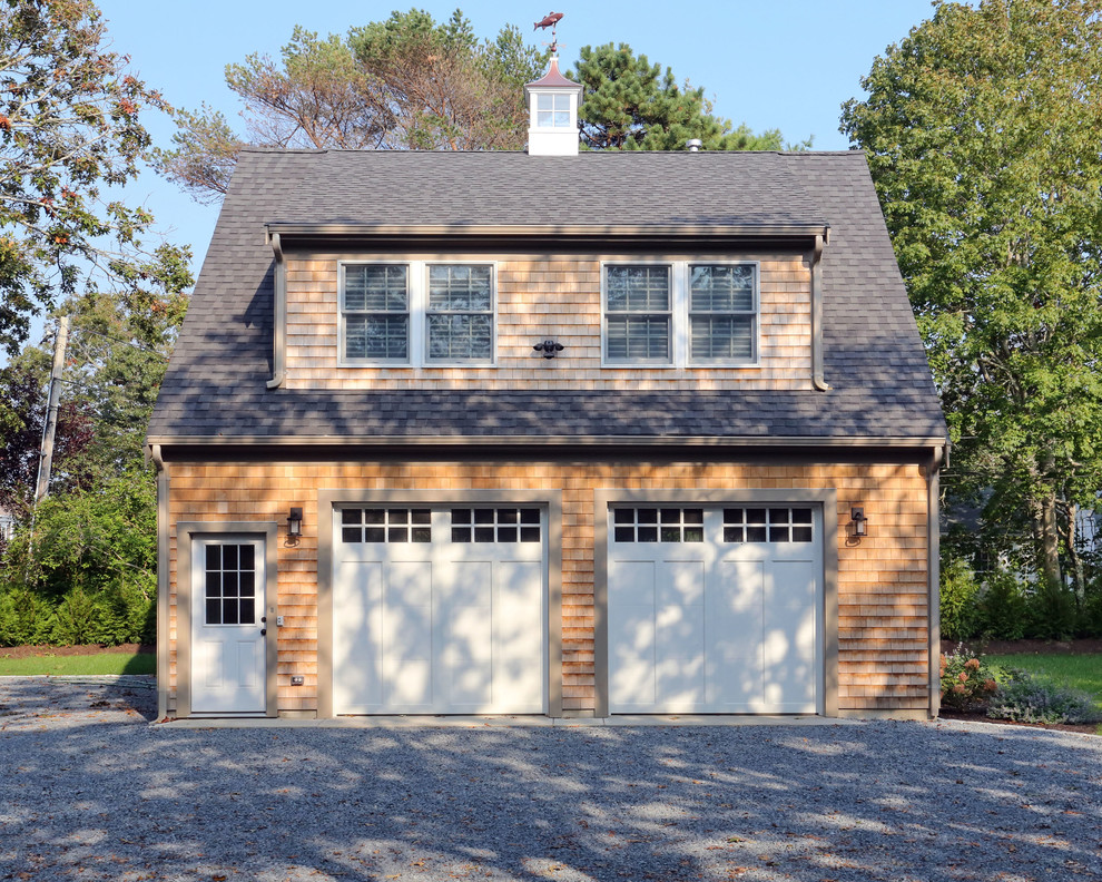 This is an example of a large traditional detached two-car garage in Boston.