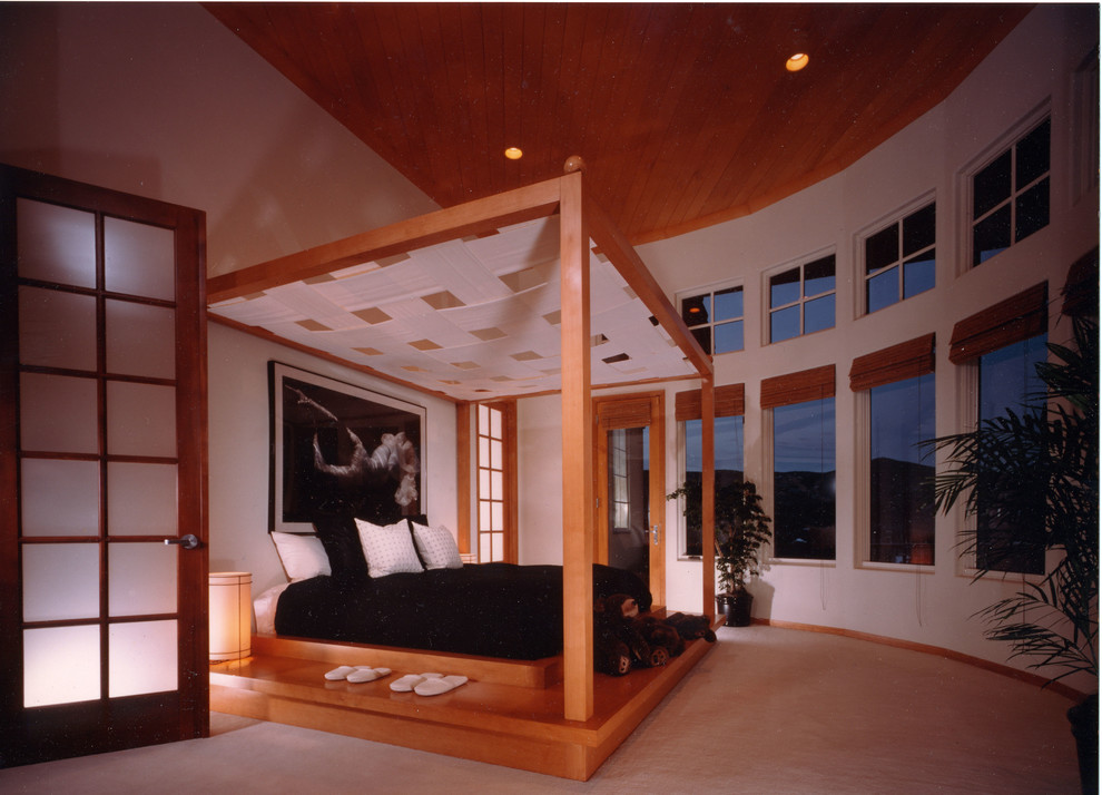 Photo of an expansive asian master bedroom in Denver with white walls and no fireplace.