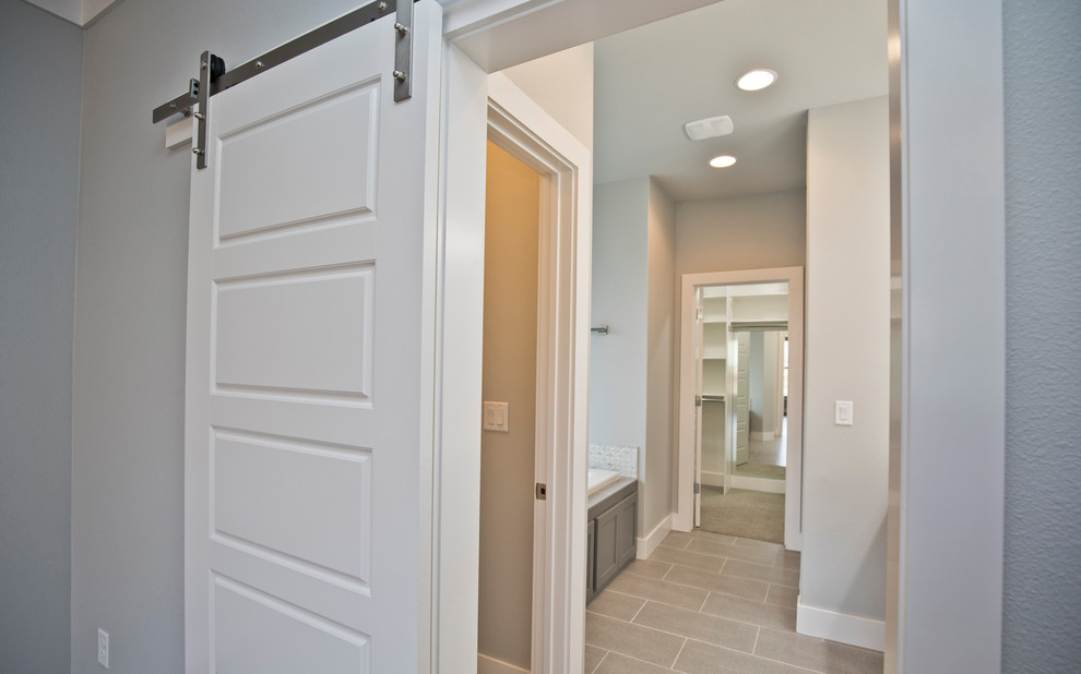Mid-sized contemporary master bathroom in Other with recessed-panel cabinets, grey cabinets, grey walls, porcelain floors, an undermount sink, engineered quartz benchtops, grey floor and white benchtops.
