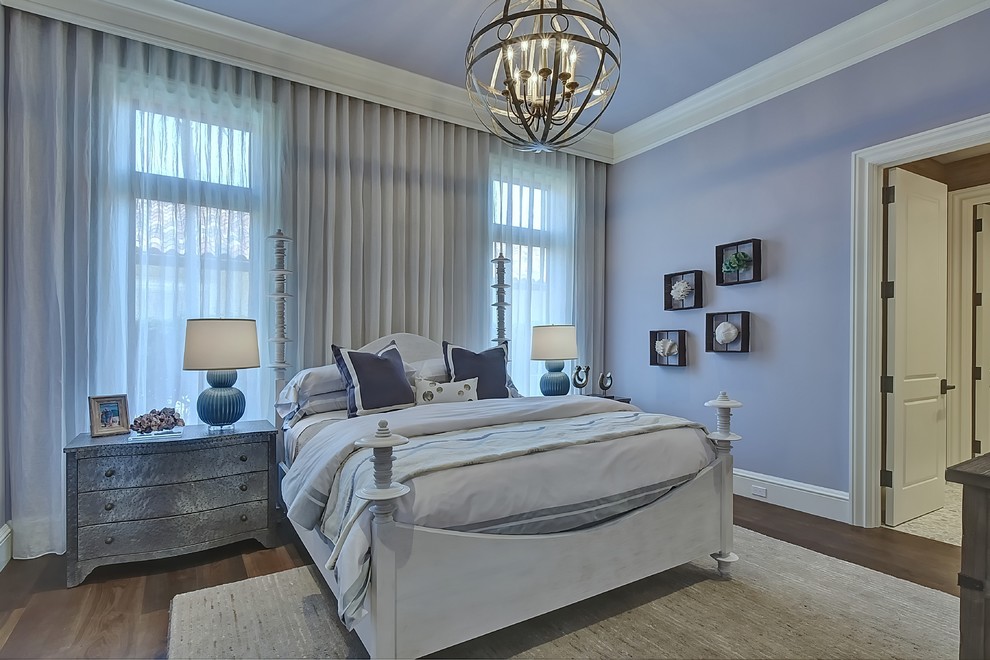 Design ideas for an expansive transitional guest bedroom in Miami with purple walls and dark hardwood floors.