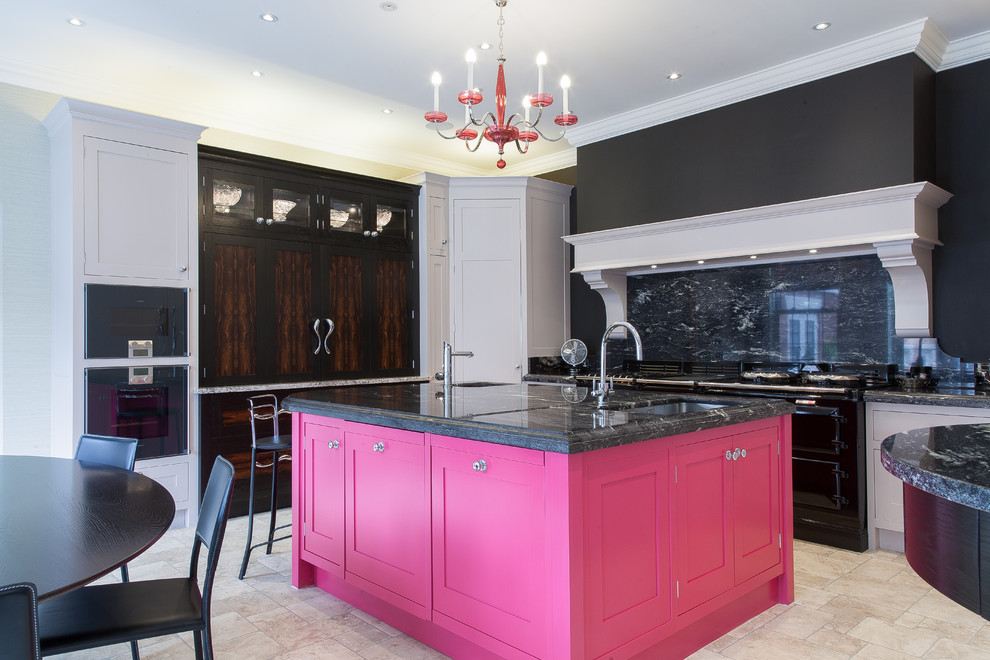 Inspiration for a mid-sized contemporary u-shaped eat-in kitchen in Cheshire with a drop-in sink, shaker cabinets, white cabinets, granite benchtops, black splashback, marble splashback, black appliances, ceramic floors, with island and beige floor.