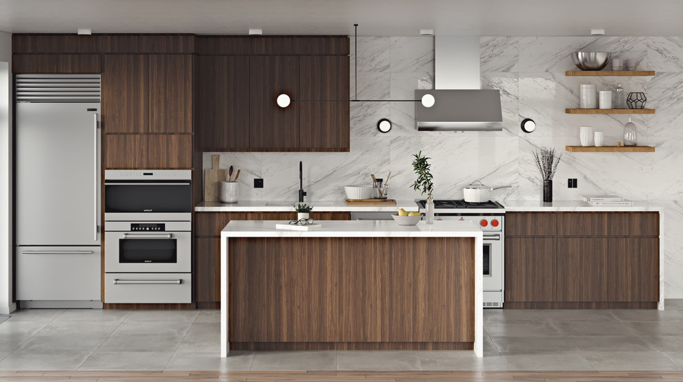 Contemporary single-wall eat-in kitchen in New York with an undermount sink, flat-panel cabinets, medium wood cabinets, marble benchtops, white splashback, marble splashback, stainless steel appliances, porcelain floors, with island, grey floor and white benchtop.