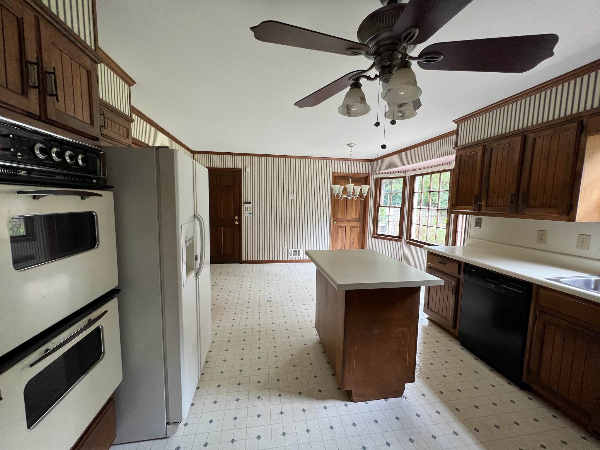PEACHTREE CORNERS - White kitchen with Green island