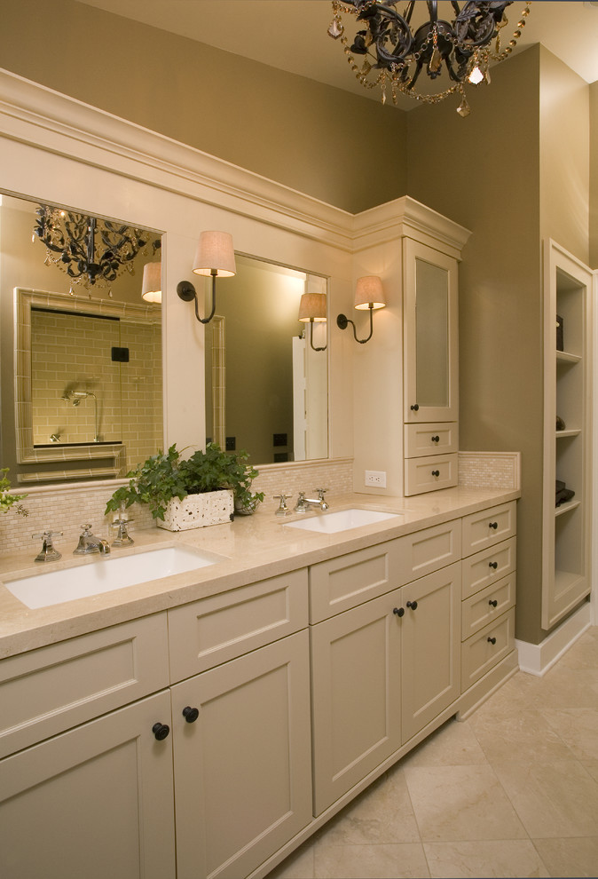 Photo of a traditional bathroom in Seattle with an undermount sink, shaker cabinets, beige cabinets, beige tile and beige benchtops.