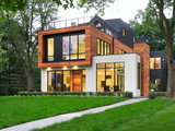 Contemporary Exterior by McCann Window & Exterior Inc