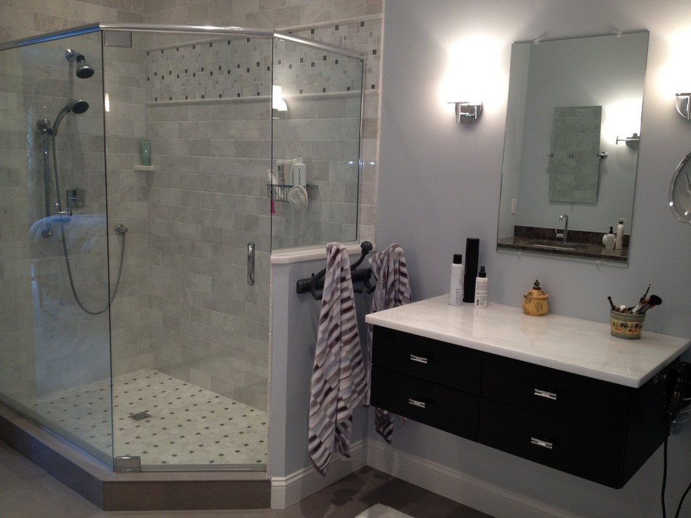 Inspiration for a large transitional master bathroom in Boston with flat-panel cabinets, dark wood cabinets, a corner shower, white tile, stone tile, blue walls, cement tiles and marble benchtops.
