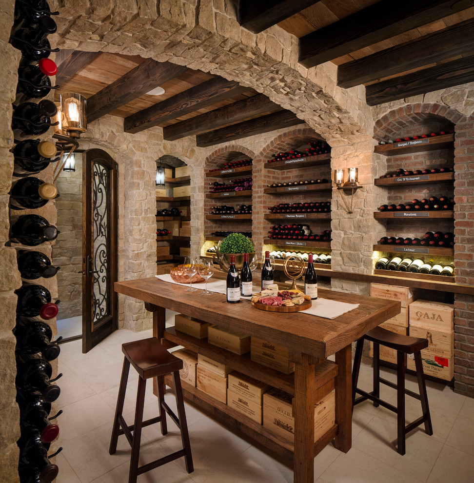 Inspiration for a mid-sized mediterranean wine cellar in San Diego with storage racks and porcelain floors.