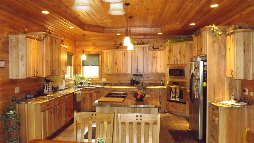 Enclosed kitchen - rustic u-shaped porcelain tile and brown floor enclosed kitchen idea with an undermount sink, granite countertops, stainless steel appliances and an island