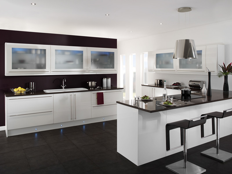 This is an example of a mid-sized modern u-shaped eat-in kitchen in Other with a double-bowl sink, open cabinets, white cabinets, quartzite benchtops, white splashback, cement tile splashback, stainless steel appliances, porcelain floors and with island.