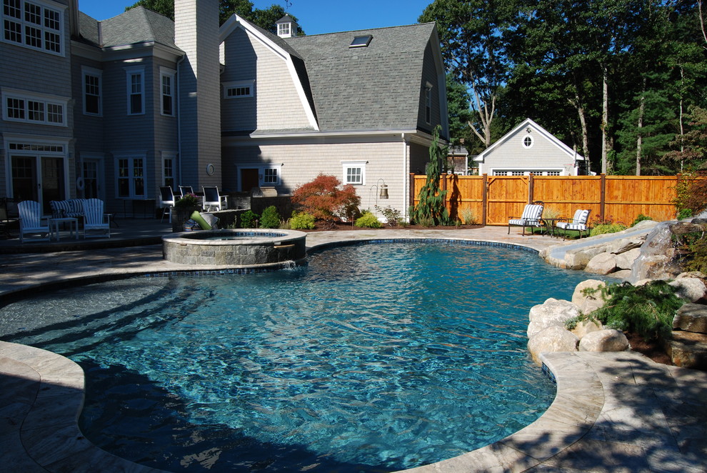 Inspiration for a mid-sized rustic backyard stone and kidney-shaped natural water slide remodel in Boston