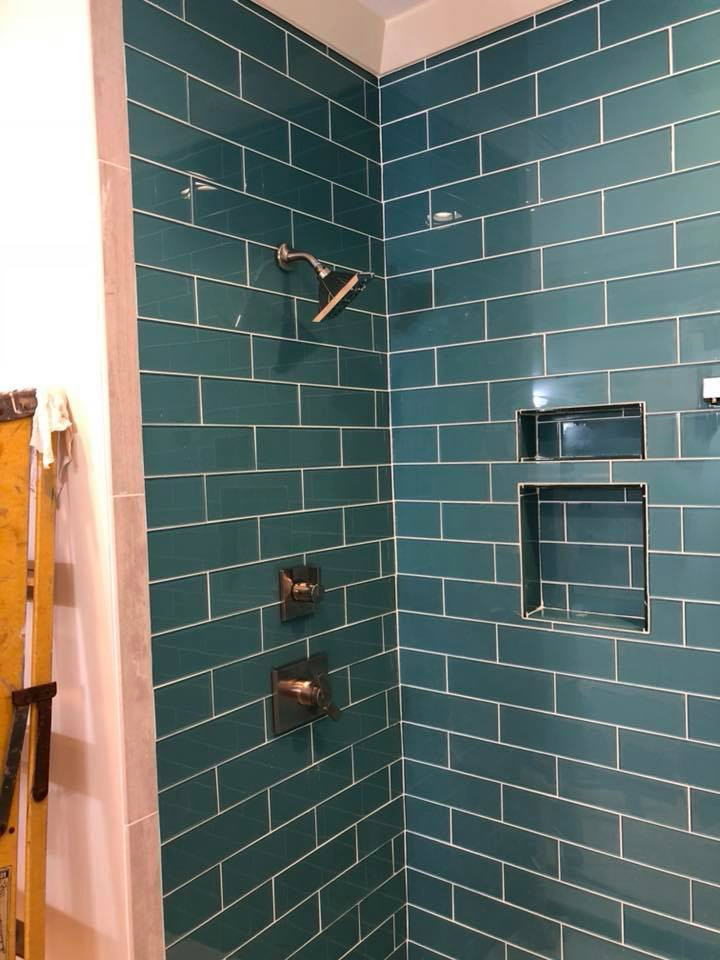Inspiration for a large mediterranean bathroom in Birmingham with blue tiles, metro tiles and white walls.