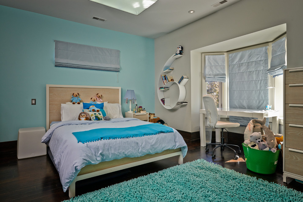 Inspiration for a mid-sized contemporary gender-neutral kids' room in Toronto with blue walls and dark hardwood floors.