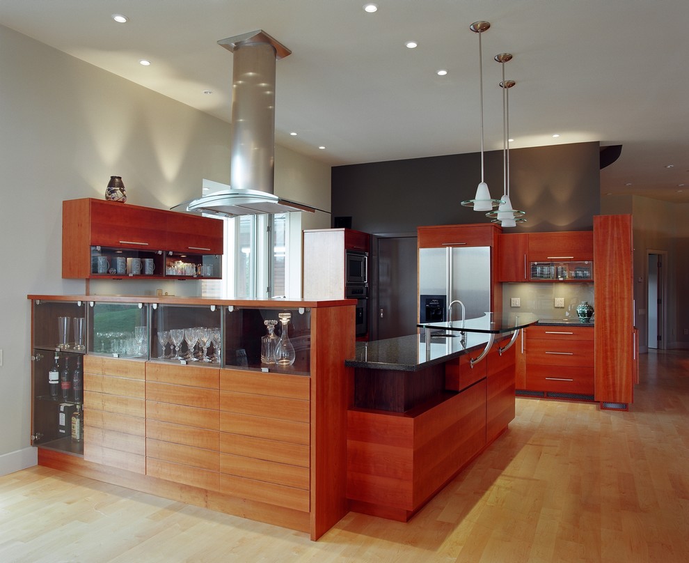 Contemporary kitchen in Ottawa with stainless steel appliances.