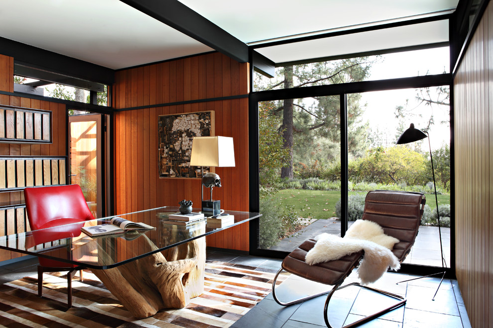 Design ideas for a midcentury study room in Los Angeles with a freestanding desk.