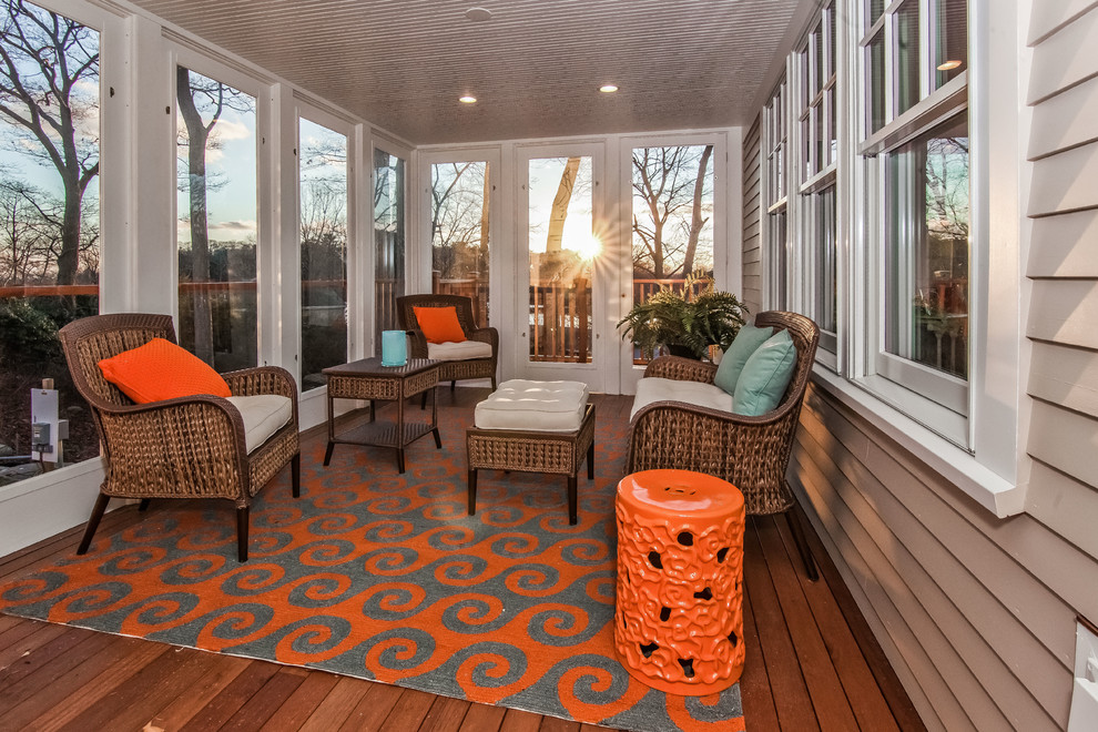 Elegant porch photo in Boston with decking and a roof extension