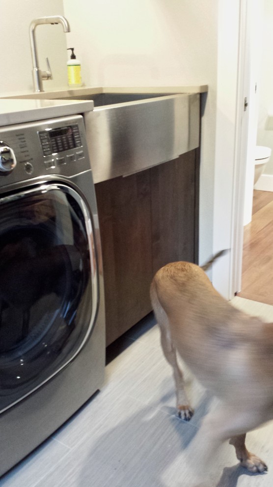This is an example of a contemporary laundry room in Seattle.