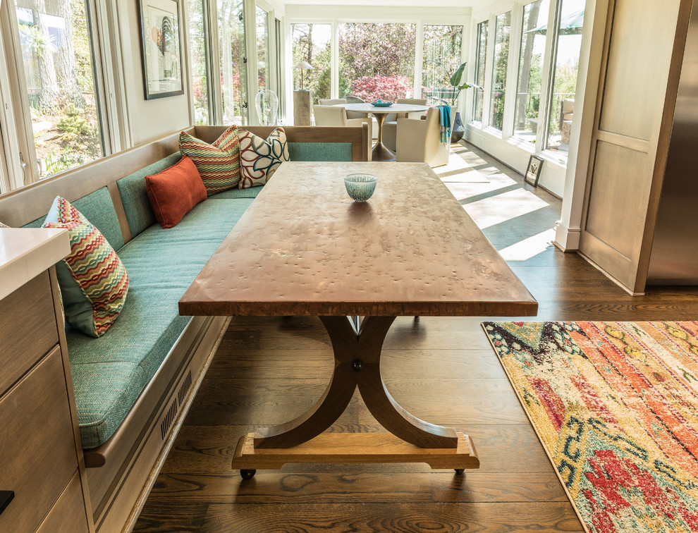 Inspiration for a mid-sized transitional u-shaped dark wood floor and brown floor open concept kitchen remodel with an undermount sink, shaker cabinets, medium tone wood cabinets, quartz countertops, stainless steel appliances, an island and beige countertops