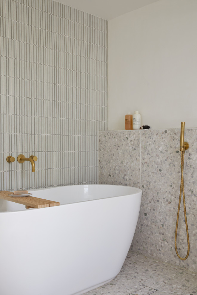 Design ideas for a small midcentury master bathroom in San Francisco with brown cabinets, a freestanding tub, a shower/bathtub combo, a wall-mount toilet, white tile, ceramic tile, white walls, terrazzo floors, an undermount sink, engineered quartz benchtops, white floor, an open shower, white benchtops, a double vanity and a floating vanity.
