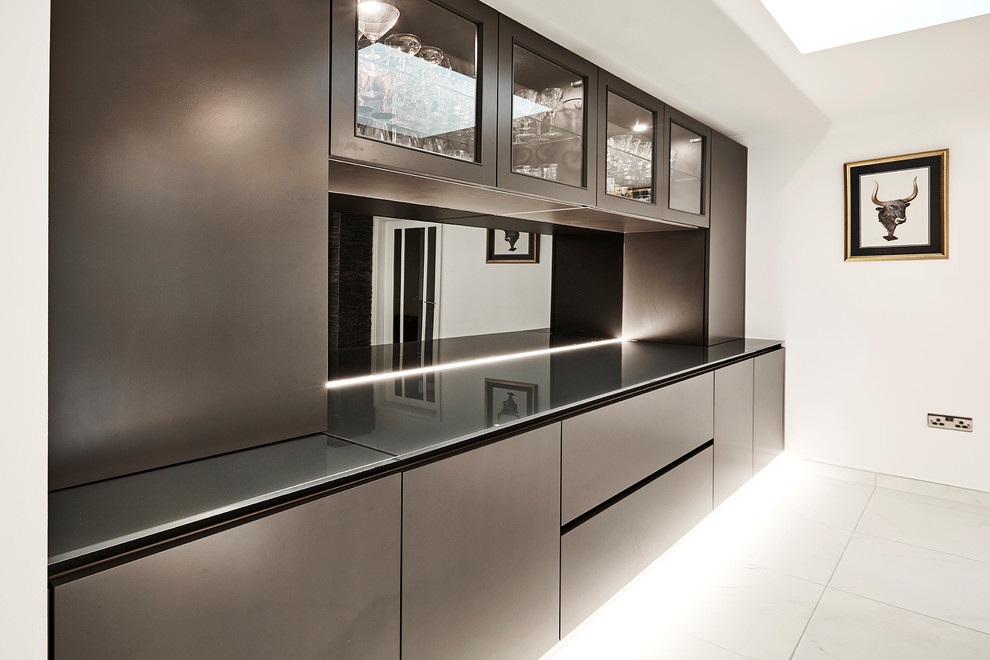 This is an example of a mid-sized contemporary single-wall eat-in kitchen in Other with a single-bowl sink, flat-panel cabinets, grey cabinets, quartz benchtops, metallic splashback, mirror splashback, coloured appliances, marble floors, with island, white floor and grey benchtop.