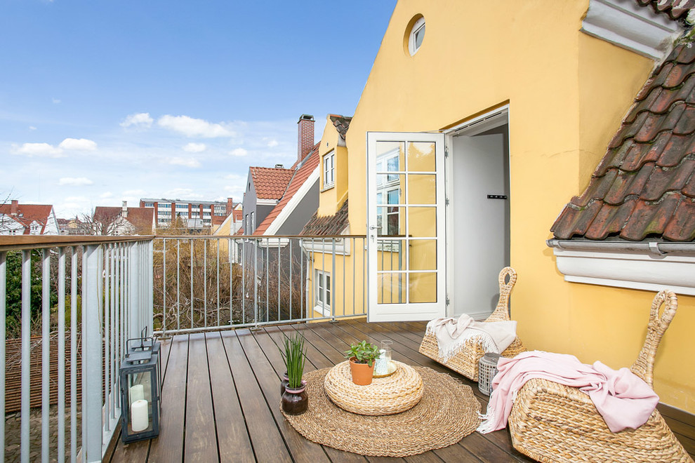 Inspiration for a large scandinavian balcony in Copenhagen with no cover.