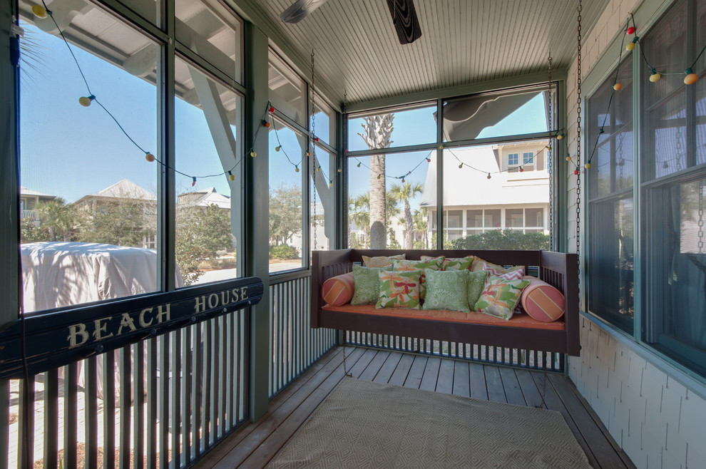 Photo of a beach style verandah in Miami.