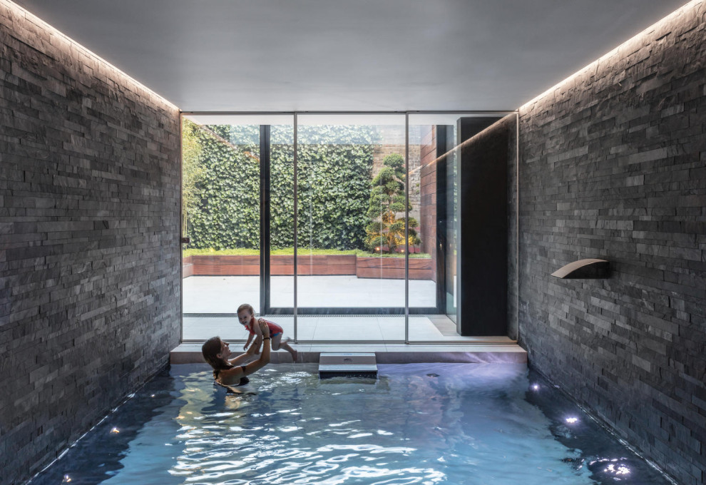 Photo of a modern pool in London.