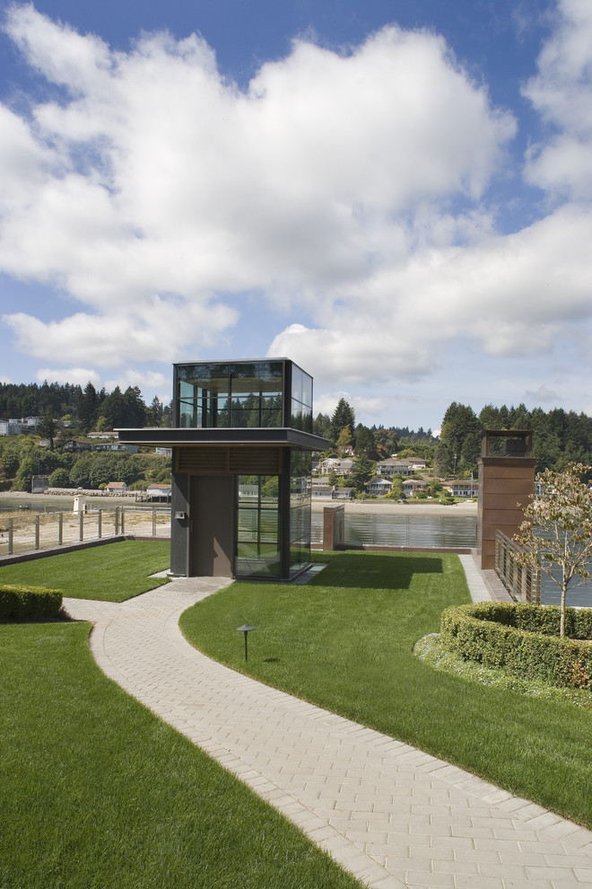 Design ideas for a small contemporary glass exterior in Seattle.