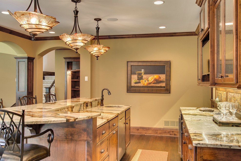 Example of a transitional home bar design in Minneapolis