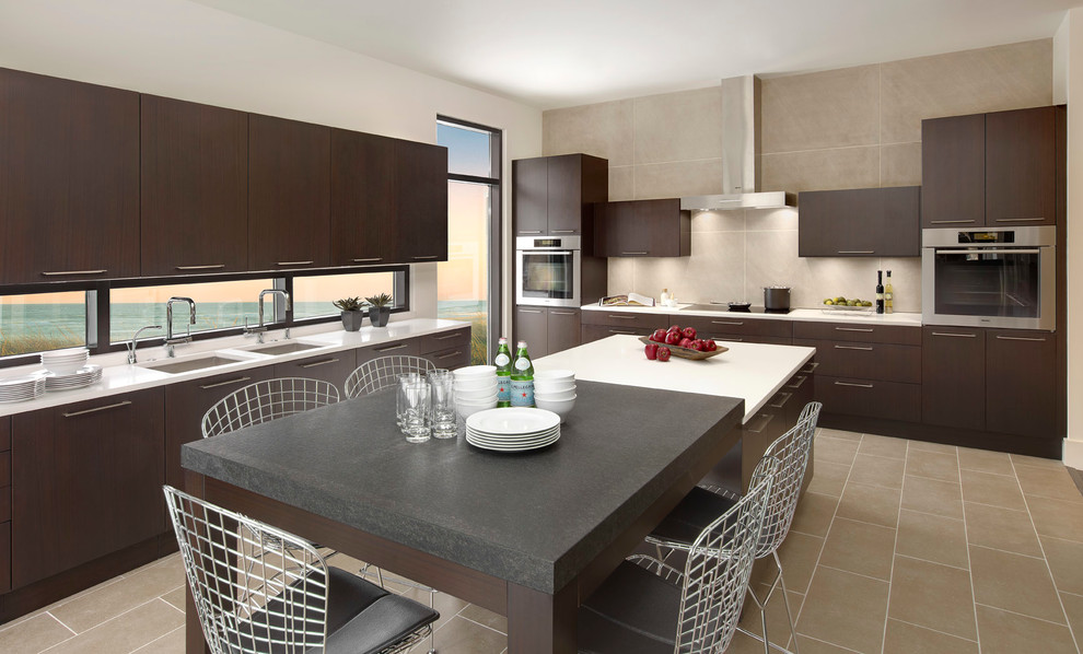 Design ideas for a large contemporary u-shaped eat-in kitchen in Detroit with an undermount sink, flat-panel cabinets, dark wood cabinets, quartz benchtops, stainless steel appliances, porcelain floors, with island and beige splashback.