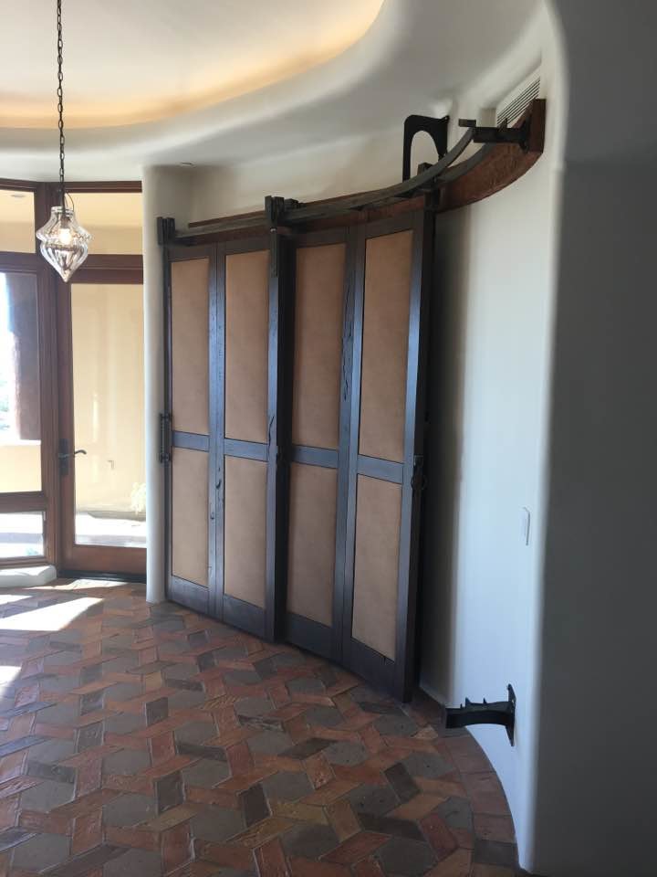 Entryway - mid-sized transitional brown floor entryway idea in Phoenix with beige walls
