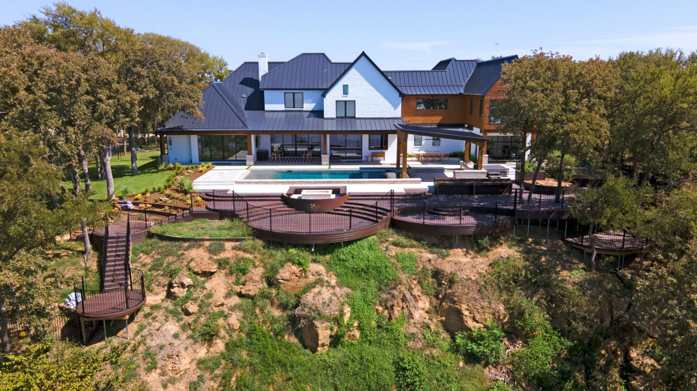 Inspiration for a modern backyard ground level deck remodel