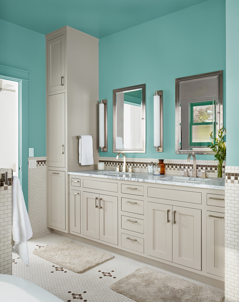 This is an example of a country bathroom in Austin with an undermount sink, shaker cabinets, grey cabinets, a freestanding tub, mosaic tile, blue walls and white tile.