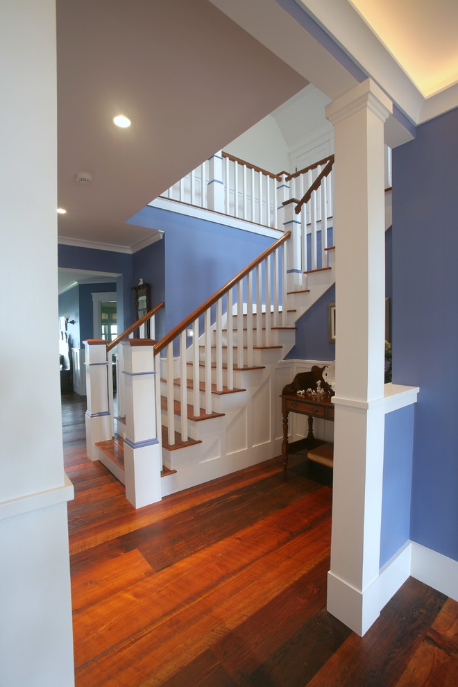This is an example of a large beach style l-shaped staircase in Boston.