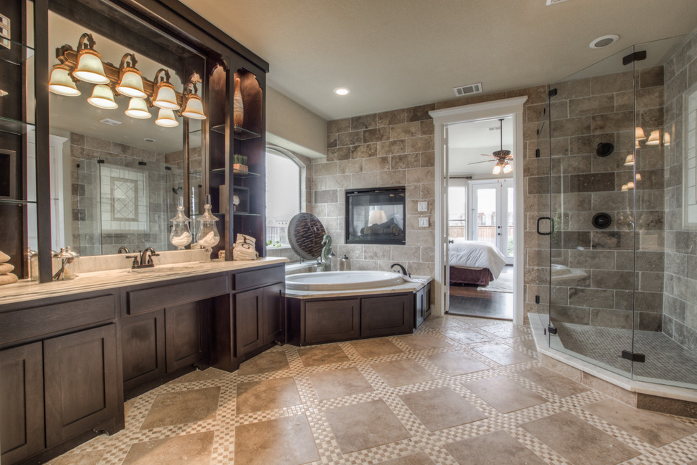 Design ideas for a traditional master bathroom in Dallas with an undermount sink, shaker cabinets, dark wood cabinets, granite benchtops, a drop-in tub, a curbless shower, a two-piece toilet, multi-coloured walls and ceramic floors.